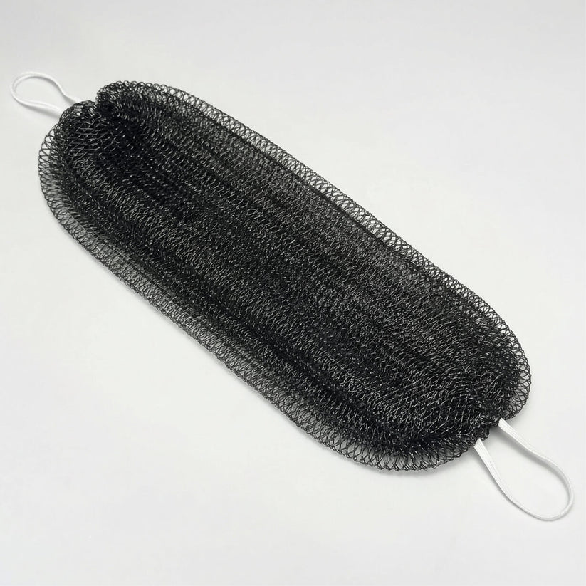 Exfoliating shower towel