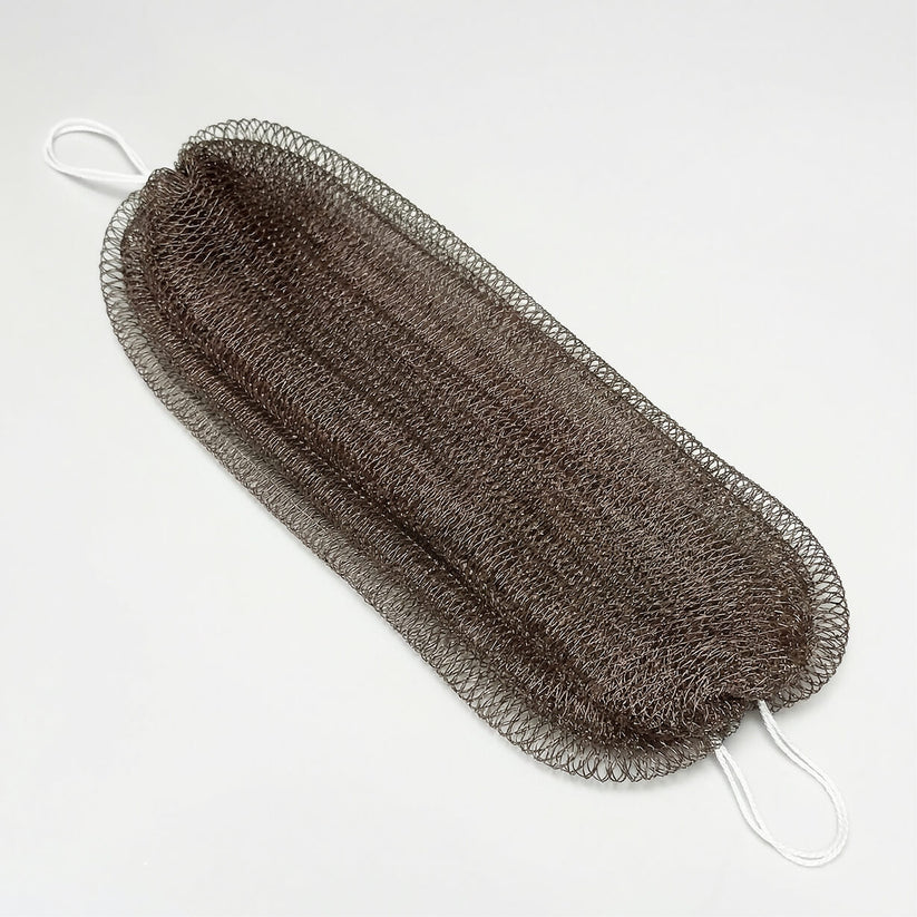 Exfoliating shower towel
