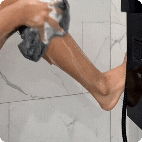 Exfoliating shower towel