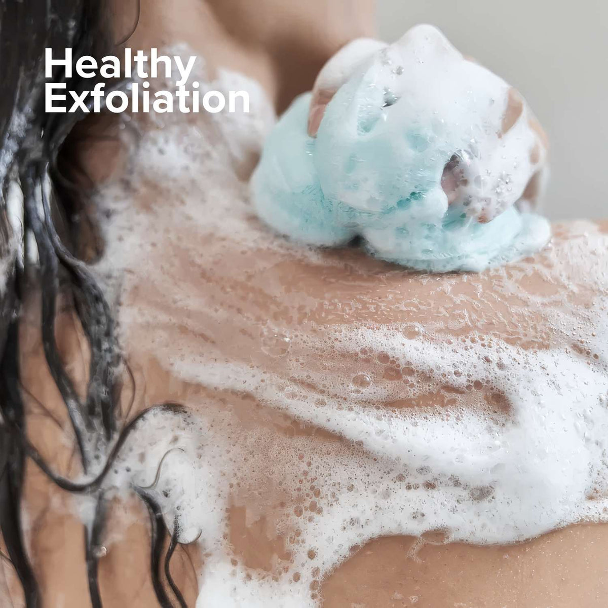 Exfoliating shower towel